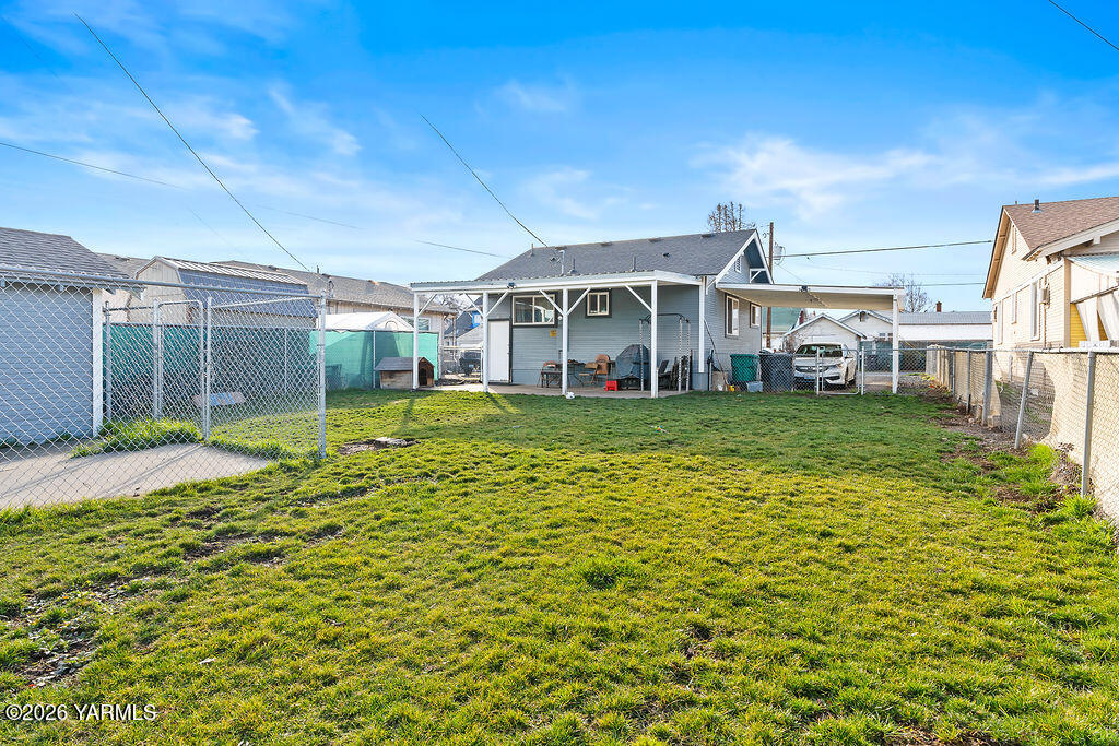 603 Cornell Avenue Yakima, WA 98902 - Photo 22 of 25 a view of a house with a yard