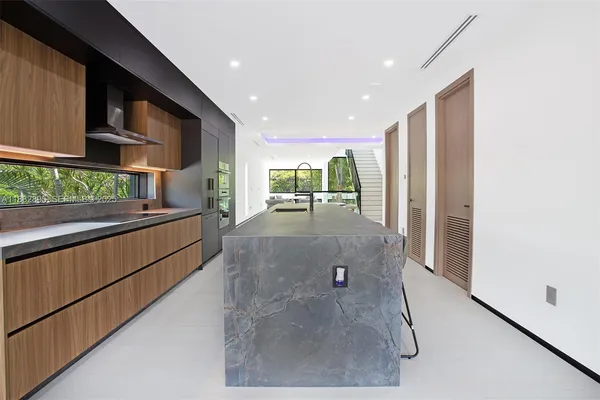 a bedroom with a bed and a table