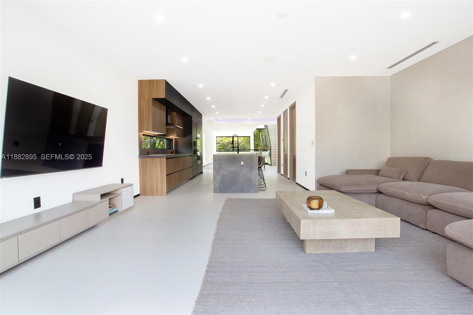 420 Southwest 15th Road Miami, FL 33129 - Photo 27 of 99 a living room with furniture and a flat screen tv
