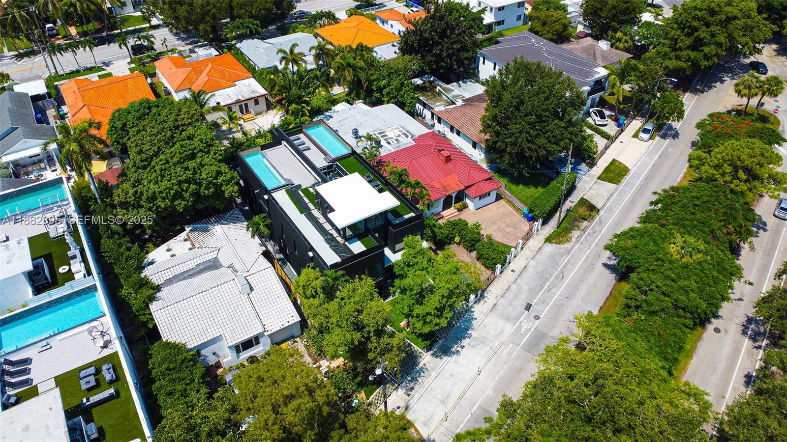 420 Southwest 15th Road Miami, FL 33129 - Photo 70 of 99 an aerial view of a house with a yard and outdoor seating