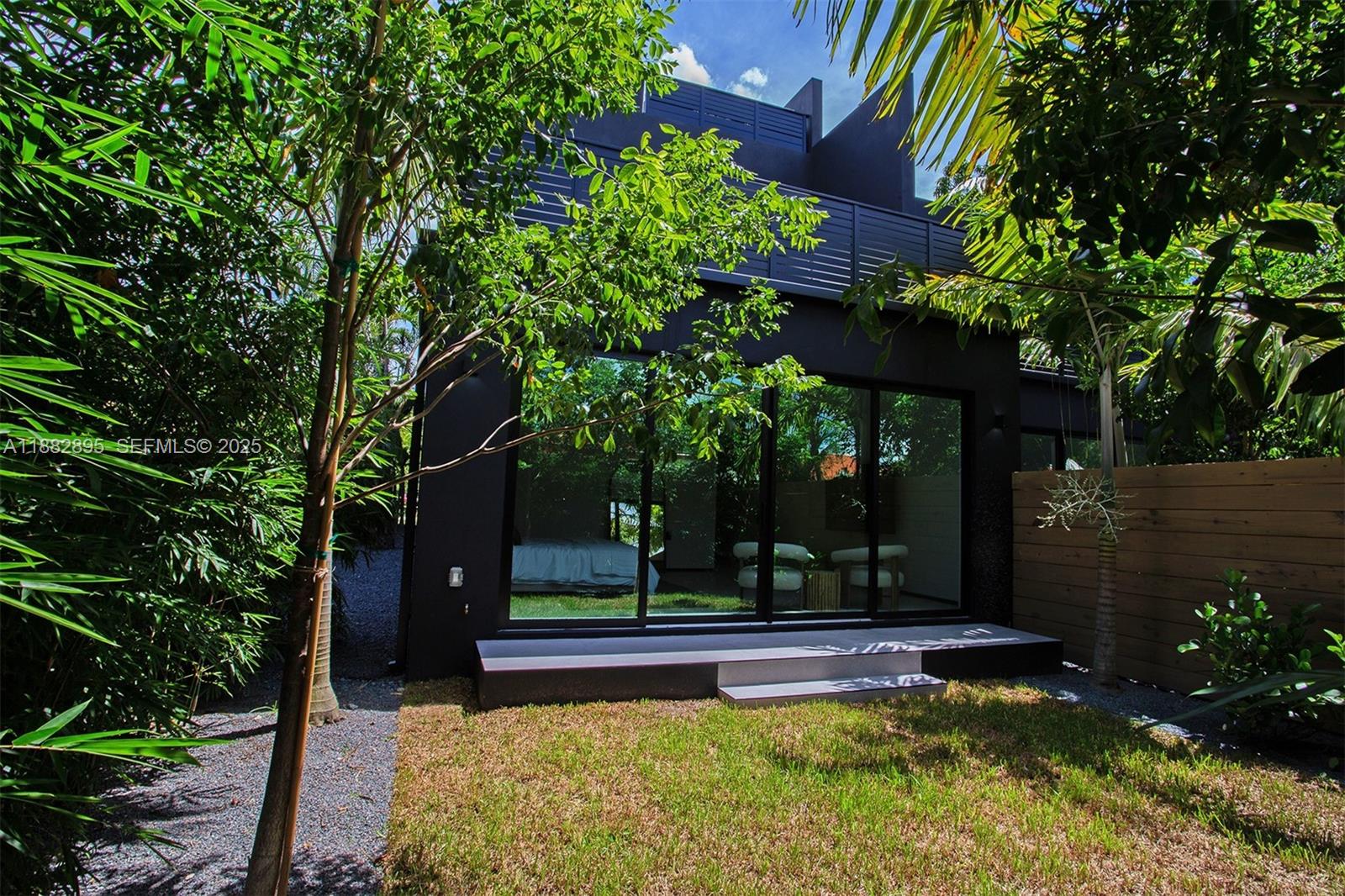 420 Southwest 15th Road Miami, FL 33129 - Photo 78 of 99 a view of a house with swimming pool and sitting area