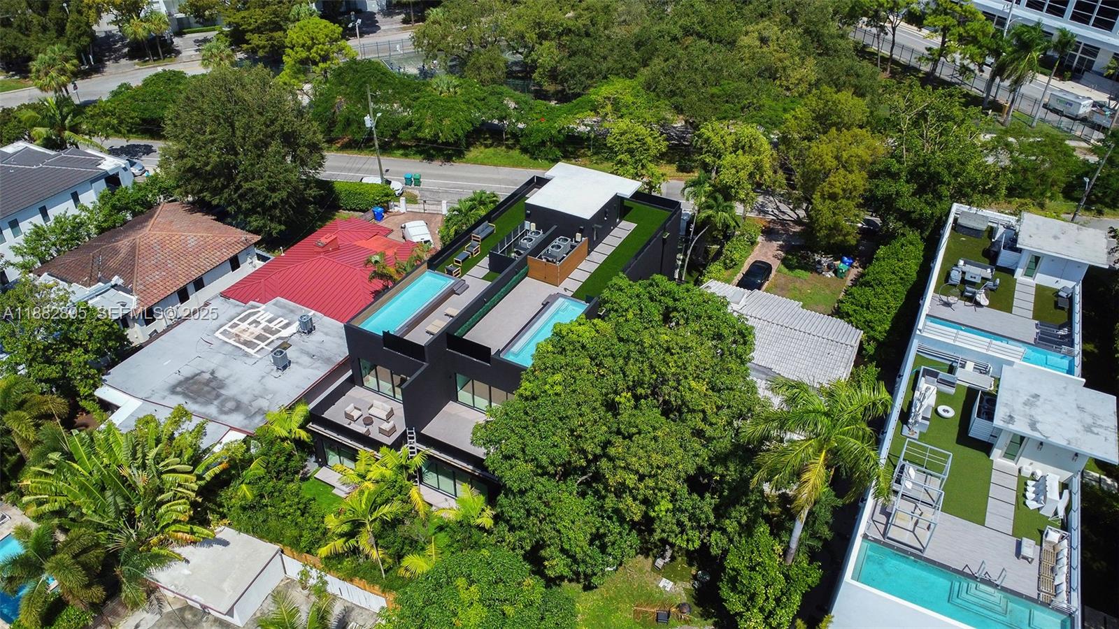 420 Southwest 15th Road Miami, FL 33129 - Photo 83 of 99 an aerial view of a house with garden space and street view