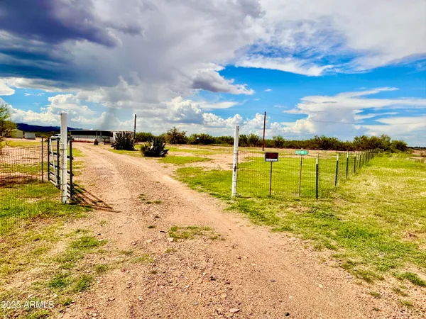 a balcony with furniture and a window