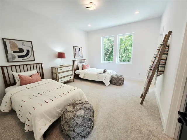 a hallway with white doors