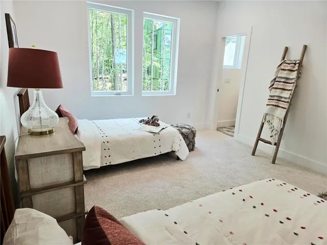 a bathroom with a toilet and a sink