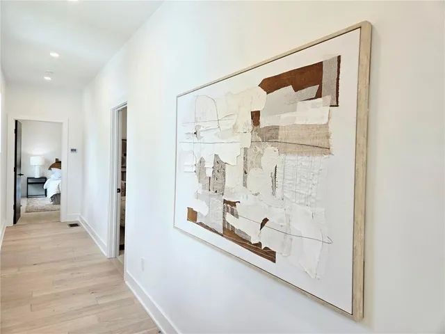 a bathroom with a shower and a sink