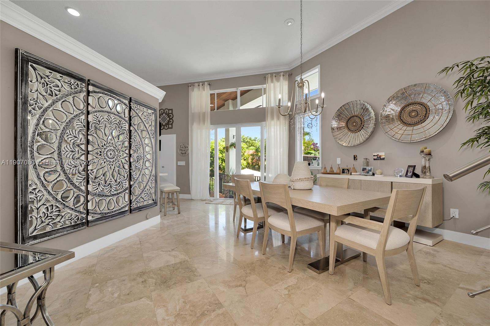 8025 Southwest 91 Avenue Miami, FL 33173 - Photo 14 of 51 a view of a table and chairs in a room