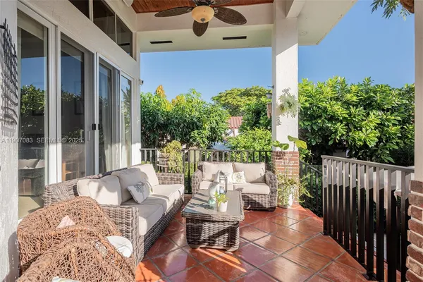 a view of balcony with furniture