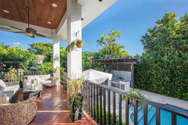 a outdoor living space with furniture and potted plants