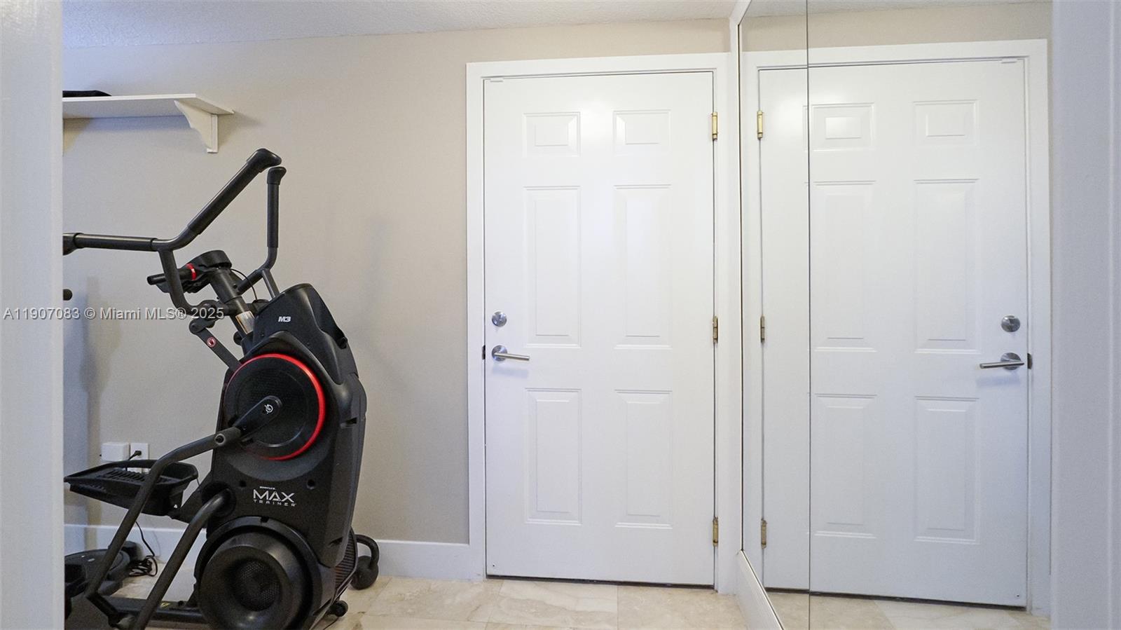 8025 Southwest 91 Avenue Miami, FL 33173 - Photo 47 of 51 a view of walk in closet with clothes shoes washer and dryer