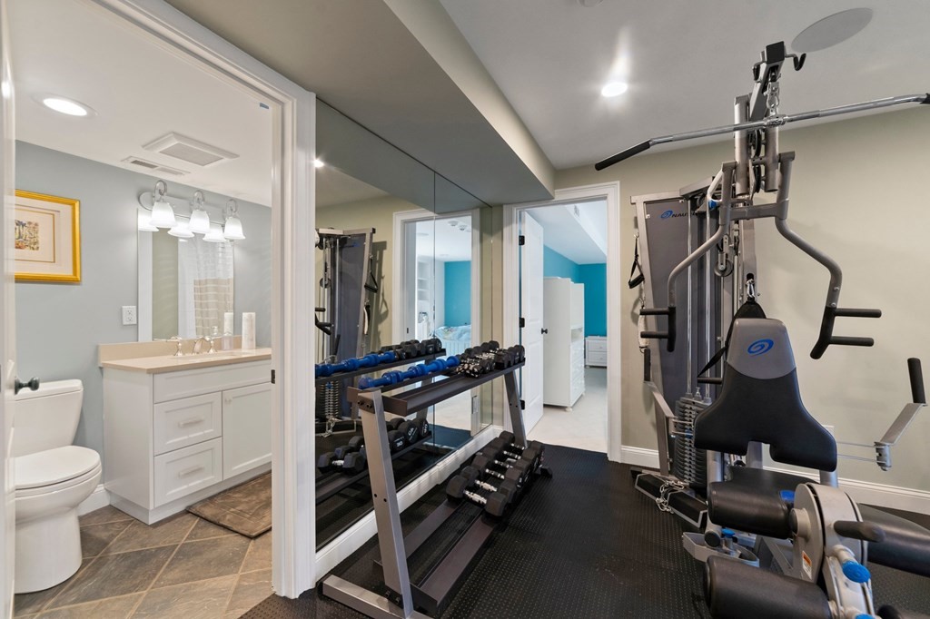 106 Pine Street Newton, MA 02465 - Photo 20 of 22 a bathroom with double vanity and a shower