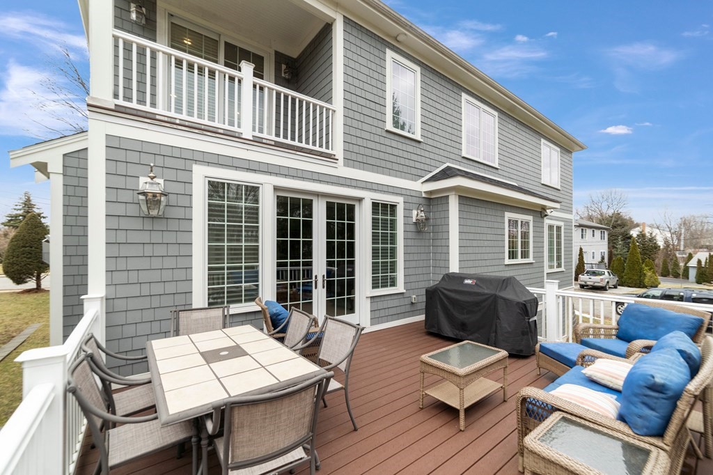 106 Pine Street Newton, MA 02465 - Photo 4 of 22 a view of a patio with couple of chairs and a table