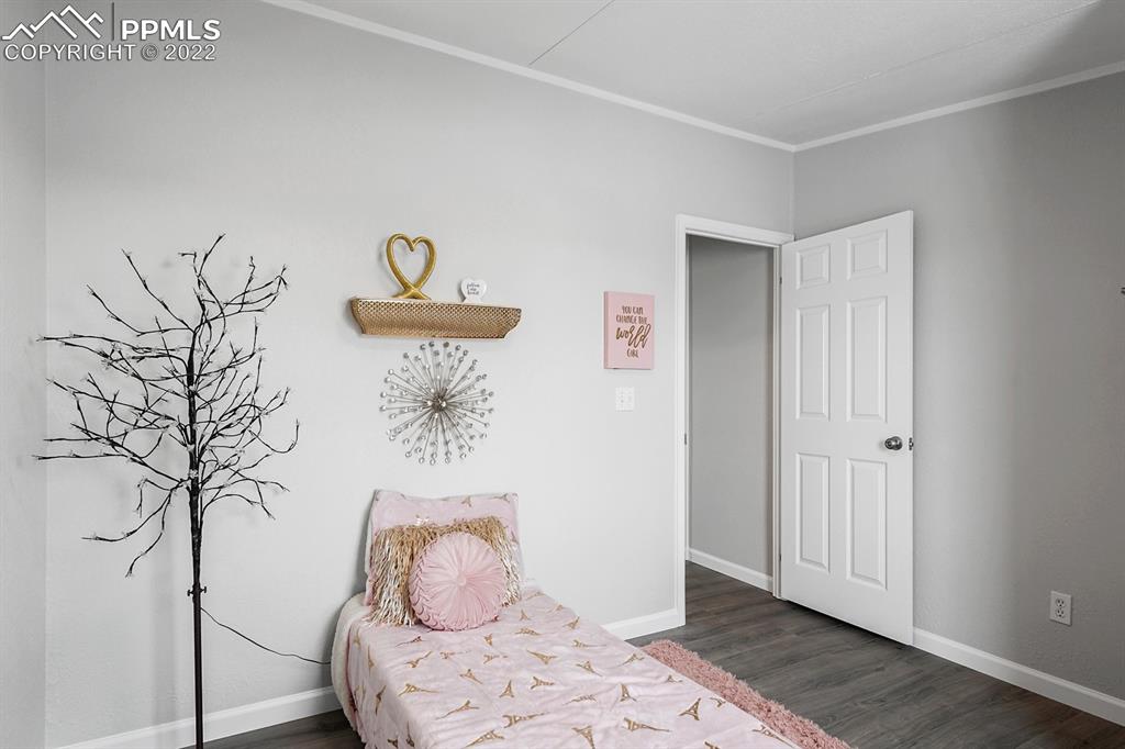 34010 Sanborn Road Yoder, CO 80864 - Photo 20 of 35 a room with painting and a table