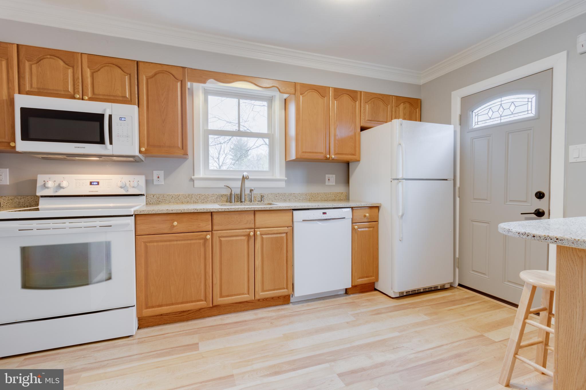 9510 Evergreen Street Silver Spring, MD 20901 - Photo 11 of 40 Bright kitchen with side entrance.