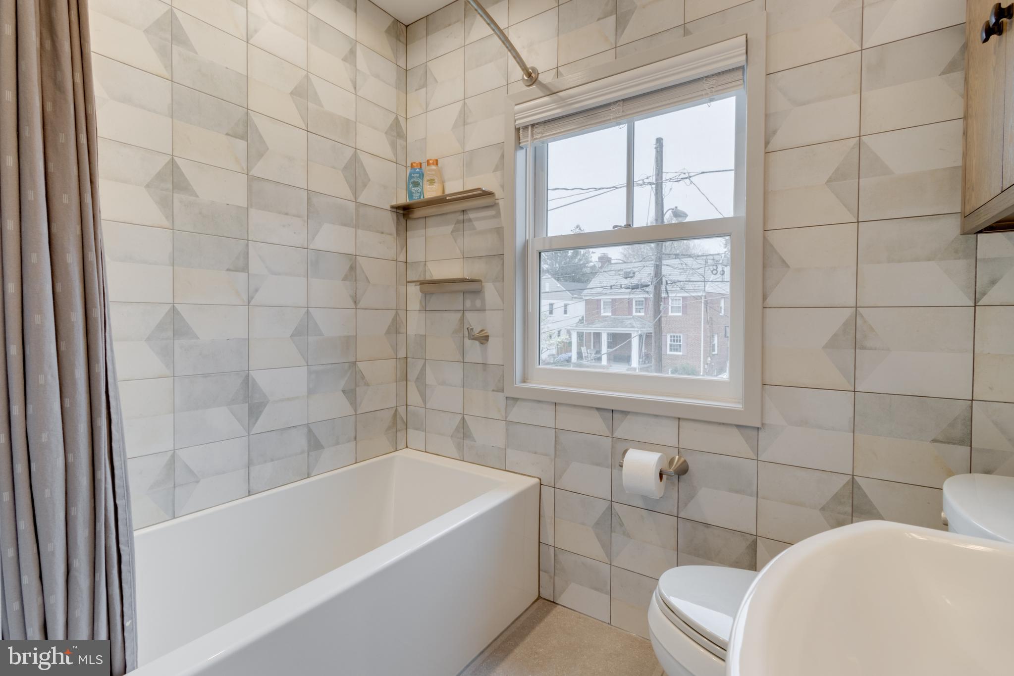 9510 Evergreen Street Silver Spring, MD 20901 - Photo 22 of 40 Gorgeous updated tile.