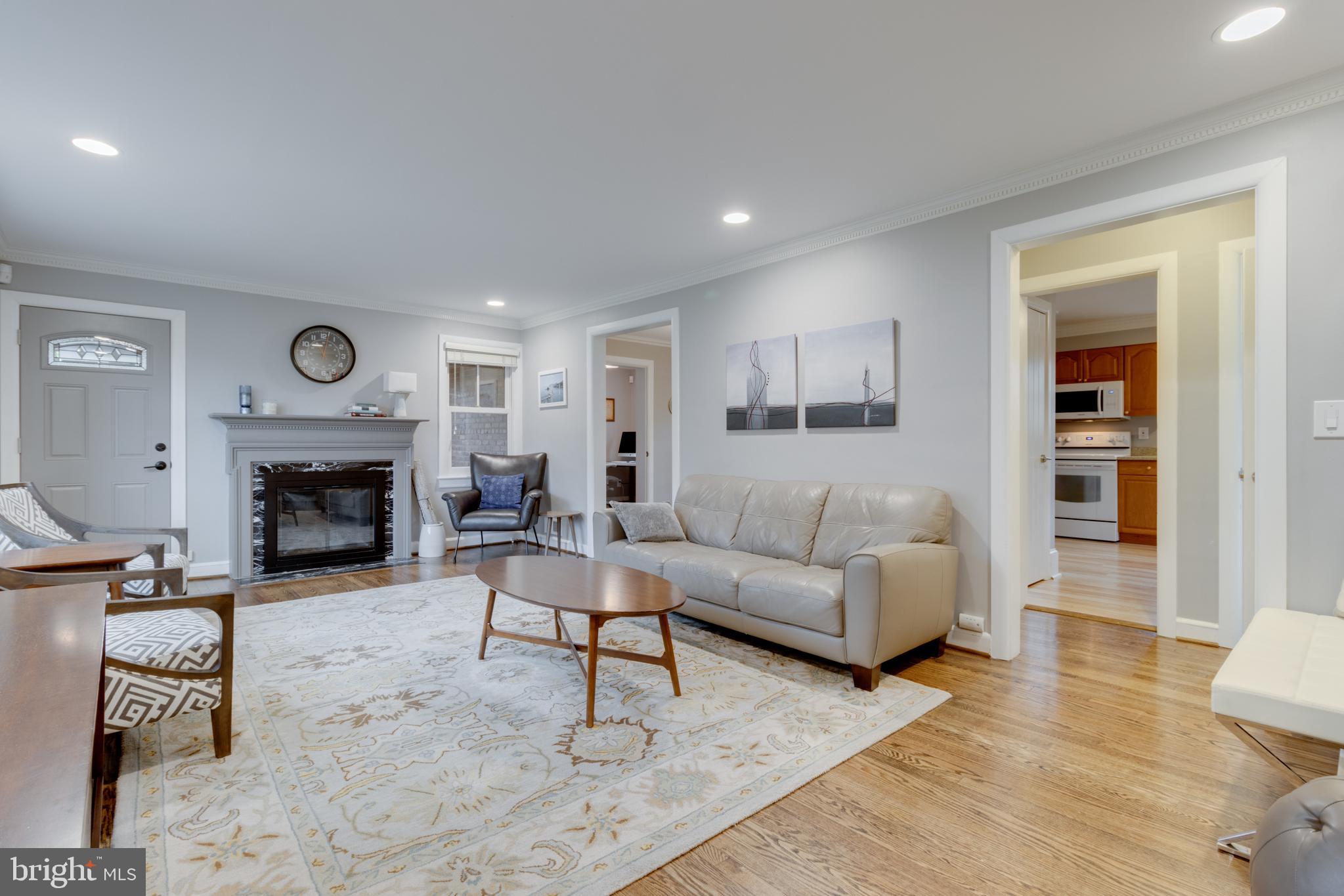9510 Evergreen Street Silver Spring, MD 20901 - Photo 5 of 40 Main level living space with w/b fireplace.