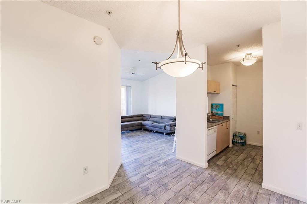 1200 Reserve Way, Unit 302 Naples, FL 34105 - Photo 7 of 12 a view of a room with utility room
