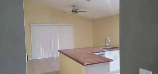 a bathroom with a sink a vanity and a mirror