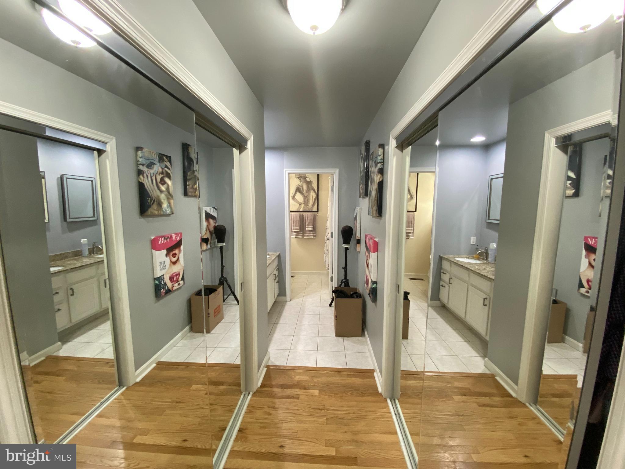 3523 Forest Hill Road Baltimore, MD 21207 - Photo 16 of 45 Stunning walkway to master bath - mirrored closets
