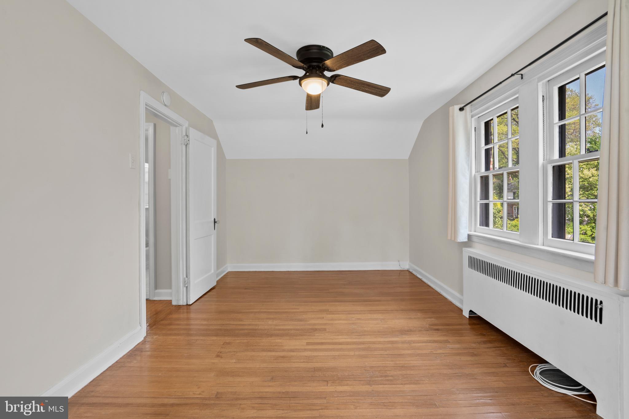 806 South Providence Road Wallingford, PA 19086 - Photo 21 of 29 wooden floor in an empty room with a window