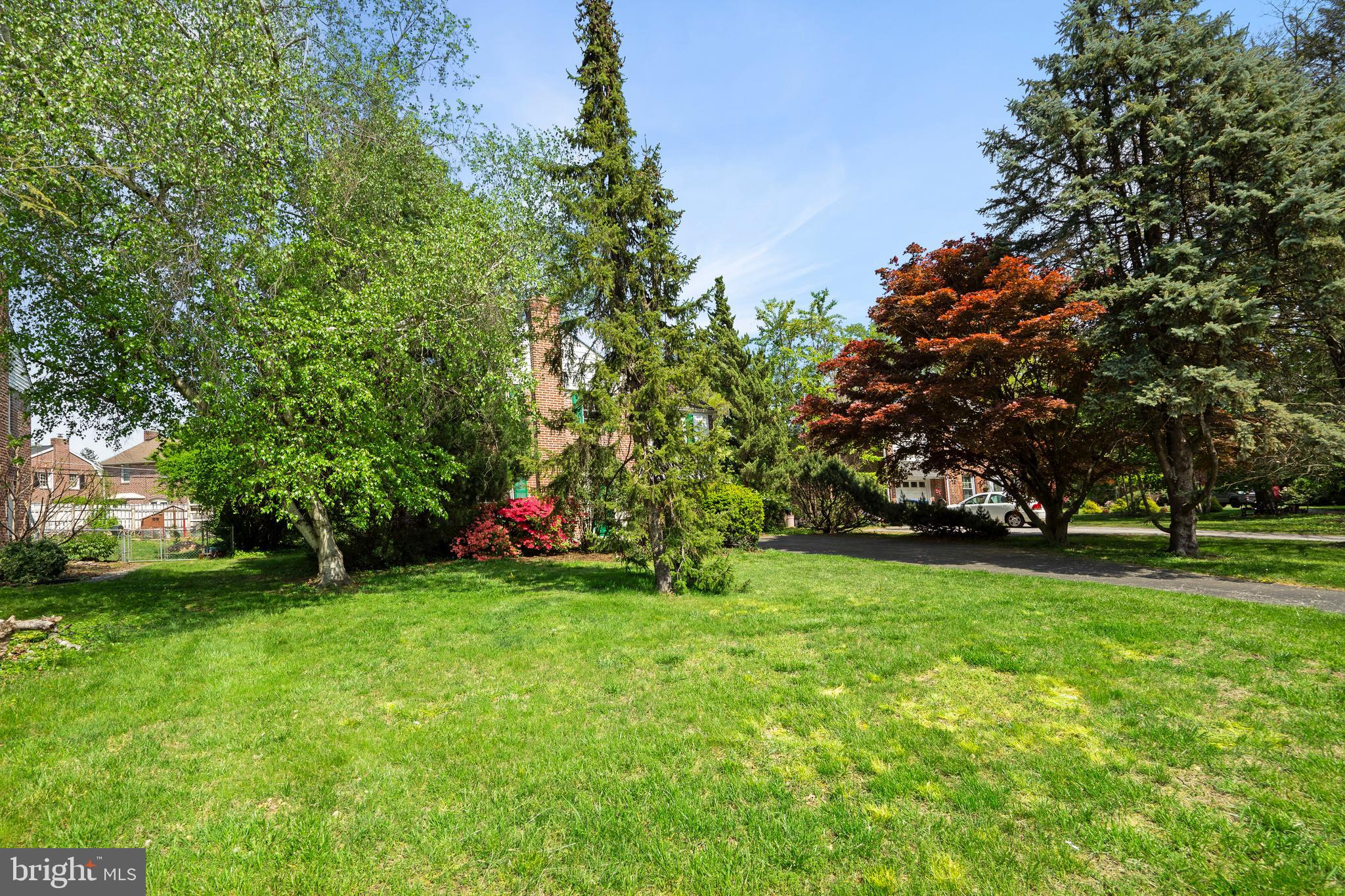 806 South Providence Road Wallingford, PA 19086 - Photo 27 of 29 a view of a field of grass and trees