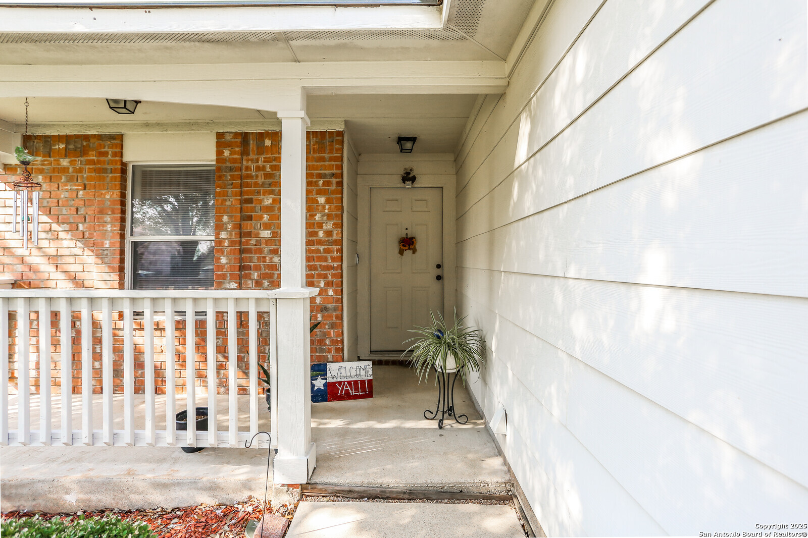 365 Leonardo Kyle, TX 78640 - Photo 3 of 17 a view of a balcony with a potted plant