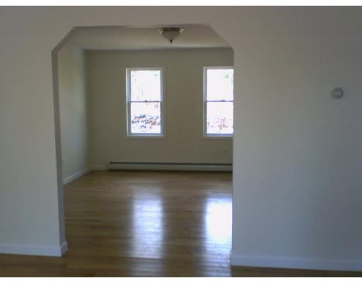 477 Oakham Road Barre, MA 01005 - Photo 3 of 3 a view of an empty room and window