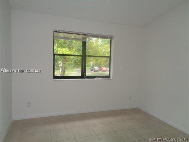 650 South Park Road, Unit 215 Hollywood, FL 33021 - Photo 11 of 24 an empty room with a window