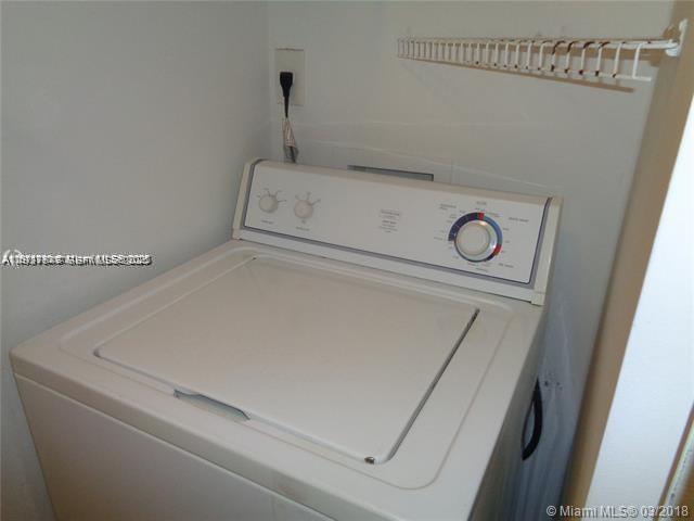 650 South Park Road, Unit 215 Hollywood, FL 33021 - Photo 15 of 24 a close up view of washer and dryer
