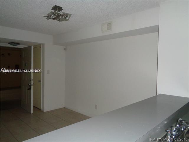 650 South Park Road, Unit 215 Hollywood, FL 33021 - Photo 4 of 24 an empty room with a empty space