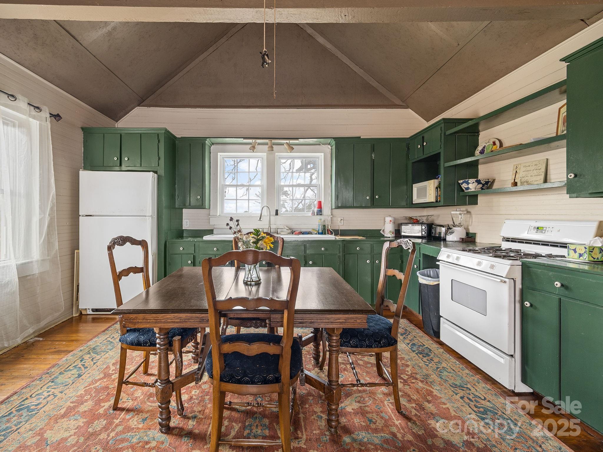 139 Clarkson Lane Tryon, NC 28782 - Photo 13 of 48 a view of a dining room with furniture and window