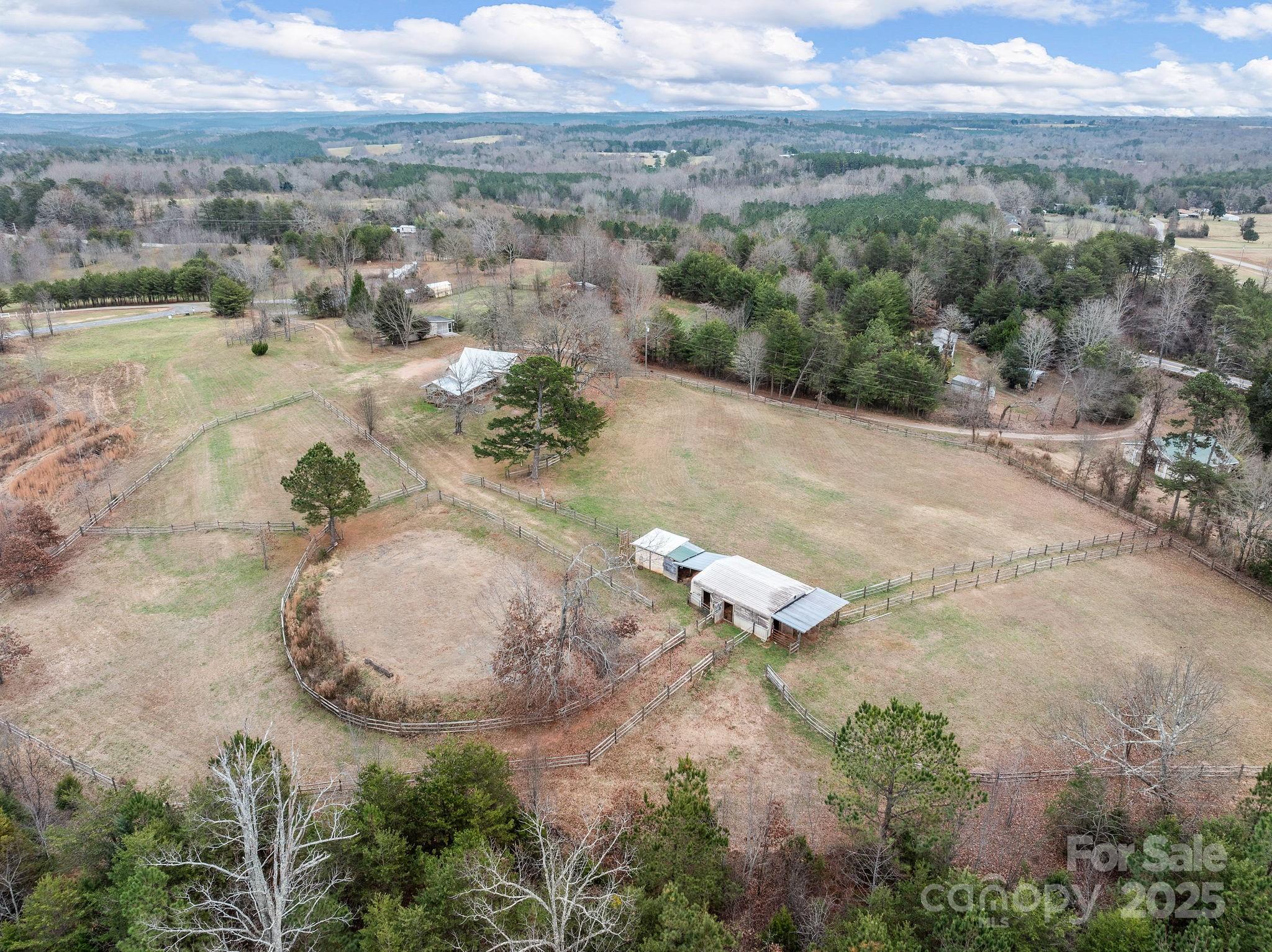 139 Clarkson Lane Tryon, NC 28782 - Photo 35 of 48 an aerial view of a house with a yard