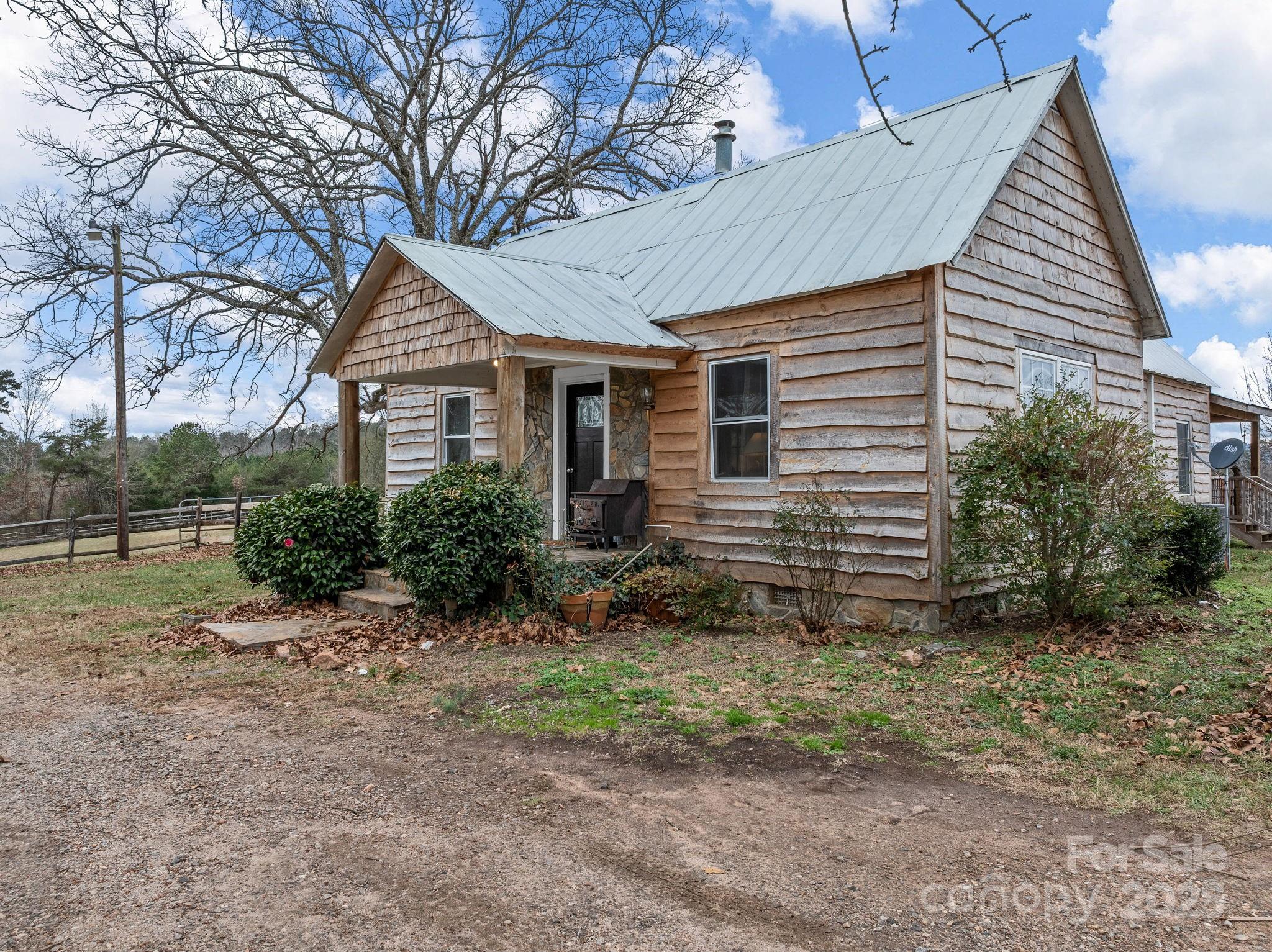 139 Clarkson Lane Tryon, NC 28782 - Photo 5 of 48 a view of a house with a yard