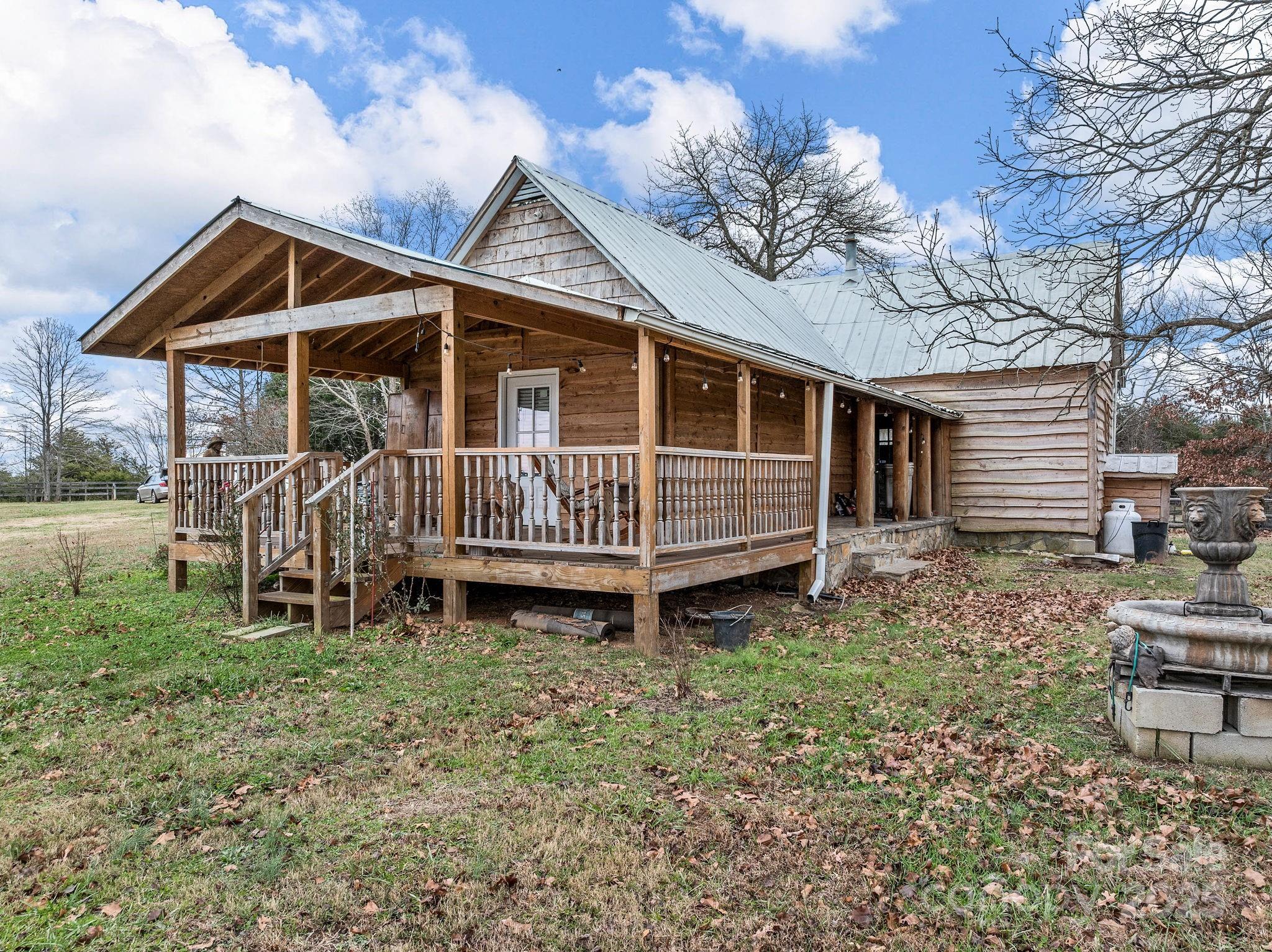 139 Clarkson Lane Tryon, NC 28782 - Photo 8 of 48 a view of a house with a yard
