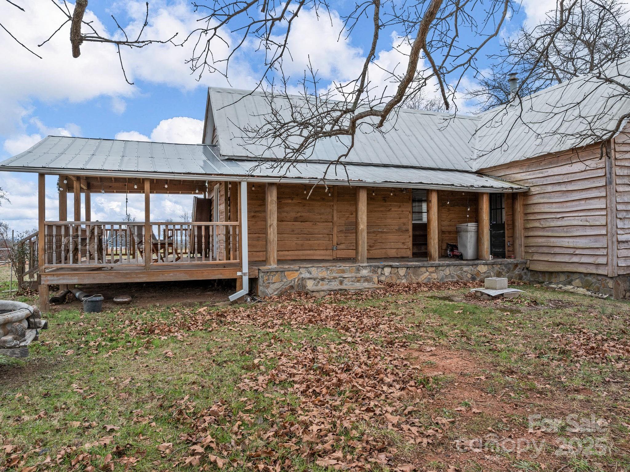 139 Clarkson Lane Tryon, NC 28782 - Photo 9 of 48 a view of a house with backyard and sitting area