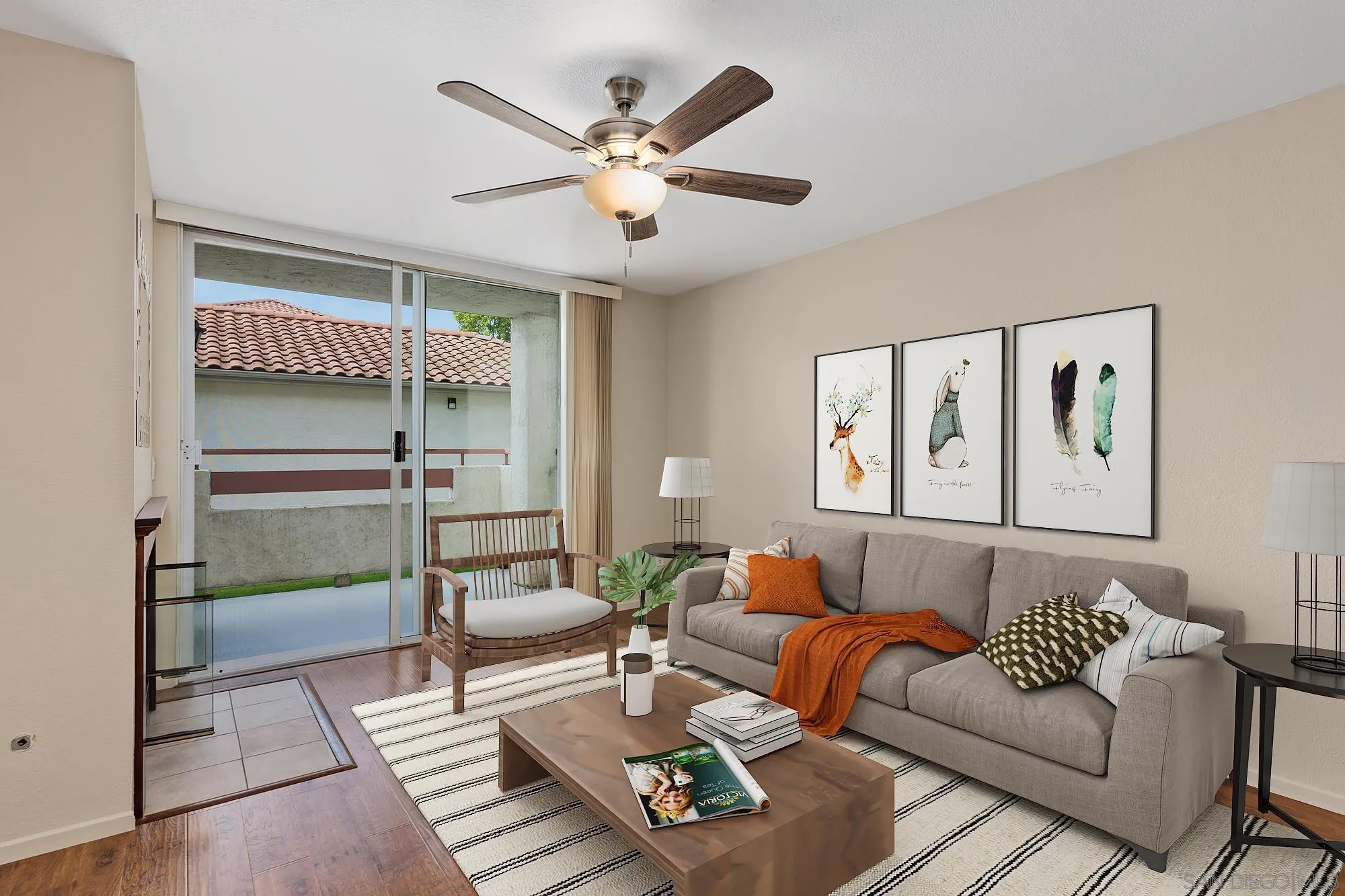 405 Stoney Point Way, Unit 89 Oceanside, CA 92058 - Photo 1 of 32 a living room with furniture and a large window