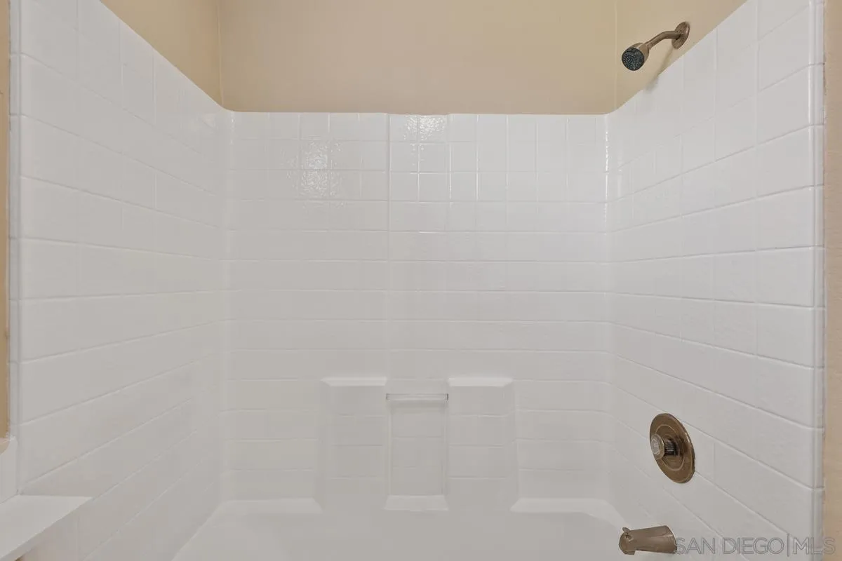 405 Stoney Point Way, Unit 89 Oceanside, CA 92058 - Photo 20 of 32 a close up of a shower