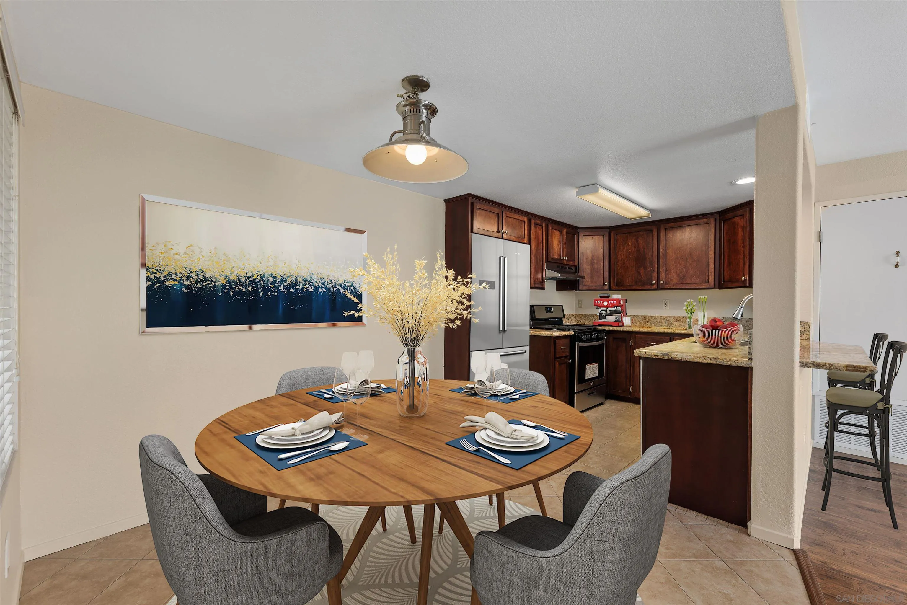 405 Stoney Point Way, Unit 89 Oceanside, CA 92058 - Photo 2 of 32 a view of a dining room with furniture