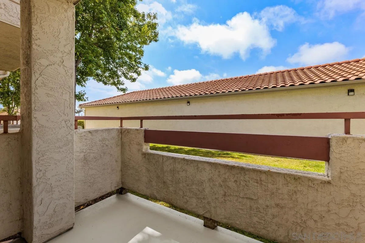405 Stoney Point Way, Unit 89 Oceanside, CA 92058 - Photo 21 of 32 a view of a swimming pool with an outdoor space and seating area