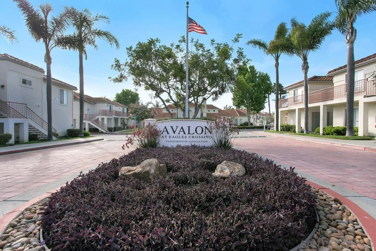 405 Stoney Point Way, Unit 89 Oceanside, CA 92058 - Photo 26 of 32 a sign board with a yard and palm trees