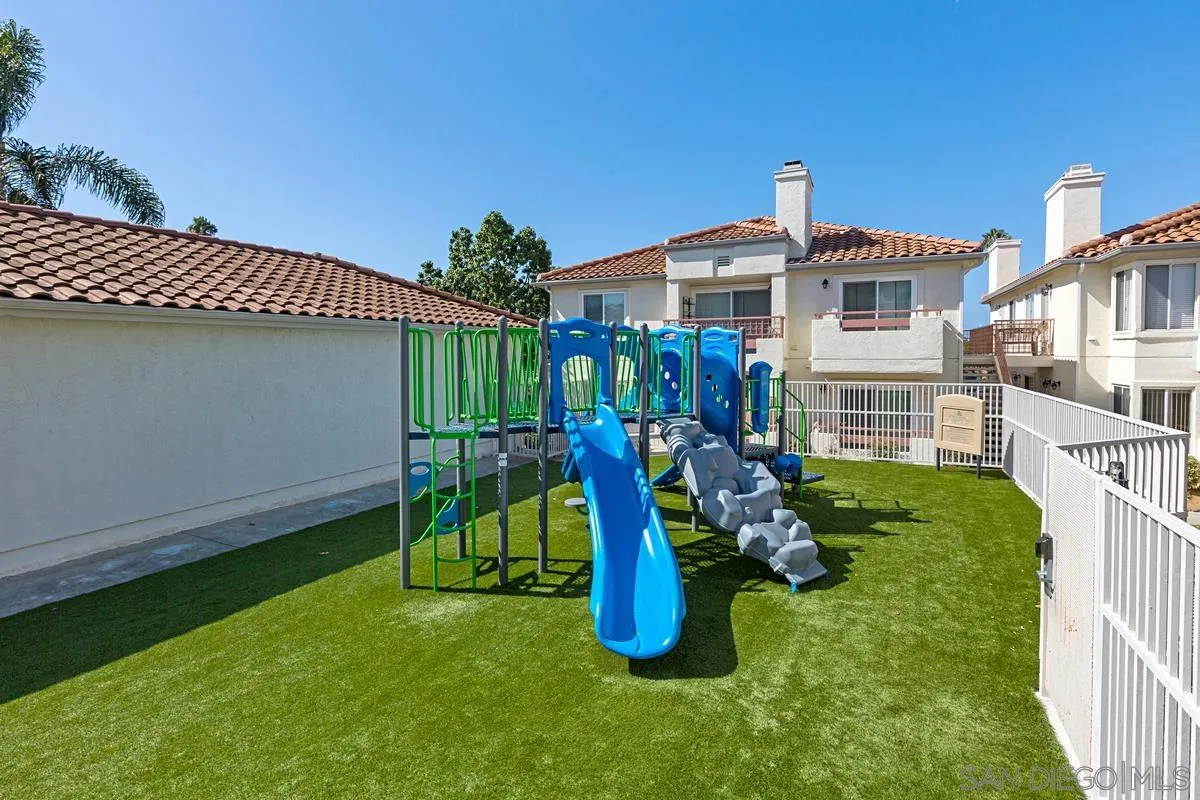 405 Stoney Point Way, Unit 89 Oceanside, CA 92058 - Photo 30 of 32 a front view of a house with garden