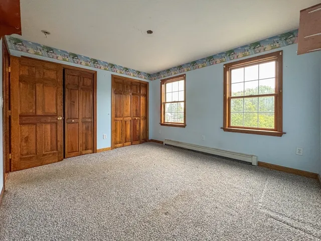 an empty room with windows