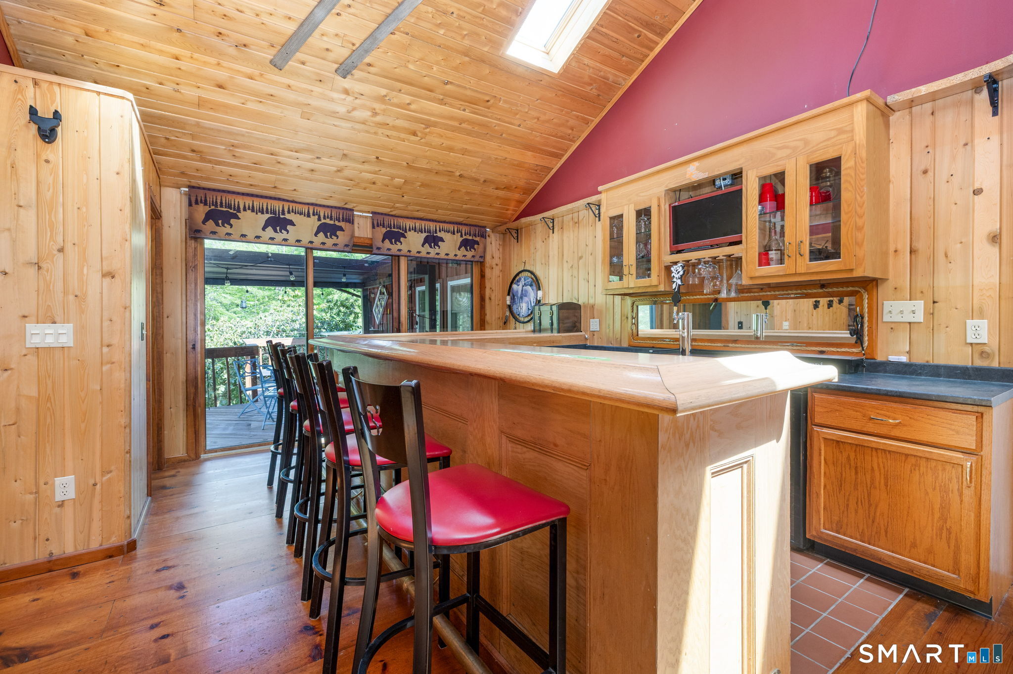 250 Center Hill Road Barkhamsted, CT 06063 - Photo 10 of 40 a kitchen with stainless steel appliances kitchen island granite countertop a dining table and chairs
