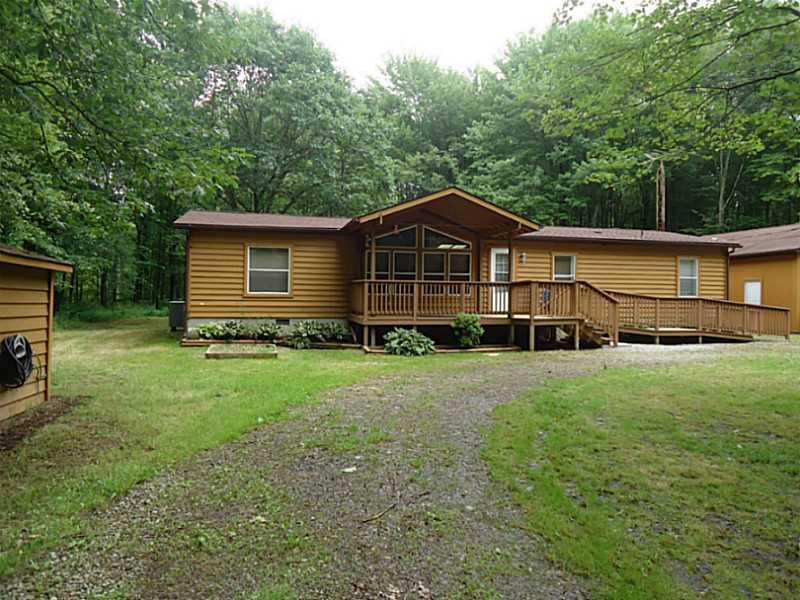 4842 Pitts Road Adamsville, PA 16110 - Photo 20 of 22 Exterior Front. circle driveway