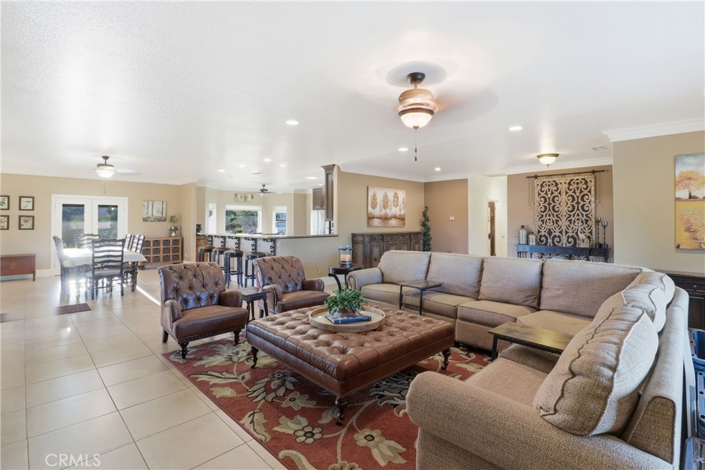 16025 Perry Heights Drive Riverside, CA 92504 - Photo 12 of 52 a living room with furniture and a table