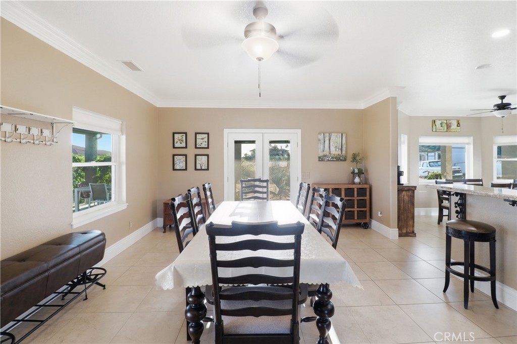 16025 Perry Heights Drive Riverside, CA 92504 - Photo 13 of 52 a dining room with furniture and window