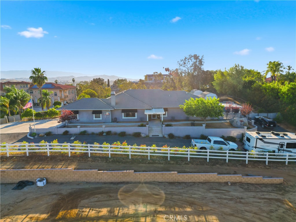 16025 Perry Heights Drive Riverside, CA 92504 - Photo 3 of 52 a view of a town with big lake and houses