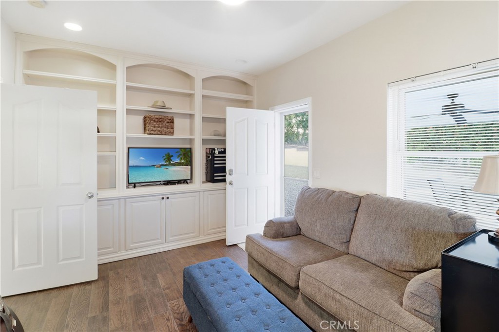 16025 Perry Heights Drive Riverside, CA 92504 - Photo 30 of 52 a living room with furniture and windows