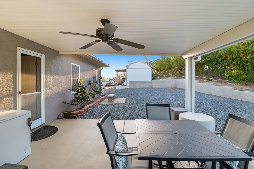 16025 Perry Heights Drive Riverside, CA 92504 - Photo 41 of 52 a view of a dining room with furniture window and outside view