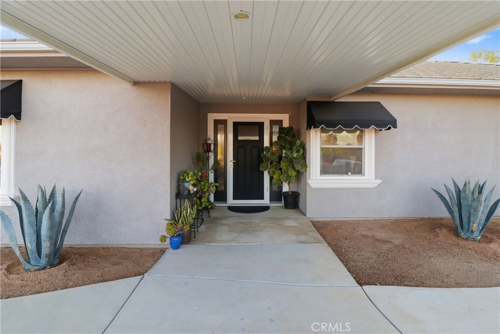16025 Perry Heights Drive Riverside, CA 92504 - Photo 5 of 52 a porch with seating space